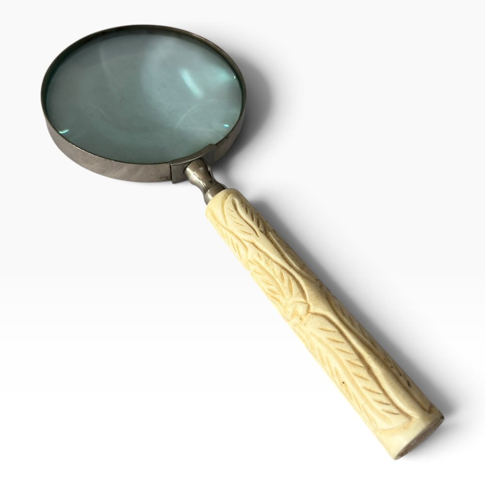 Vintage Metallic Magnifying Glass with Carved Leaf Pattern Handle